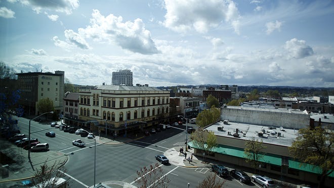 The intersection of Court and High Streets in downtown Salem is seen from the fifth floor of Courthouse Square Wednesday, April 2, 2014.