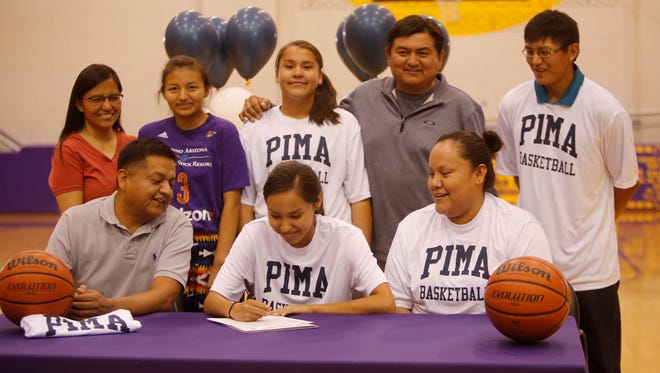 Kirtland Central's Haile Gleason signs her national letter of intent on Thursday to continue her basketball career at Pima Community College in Tuscon, Ariz.