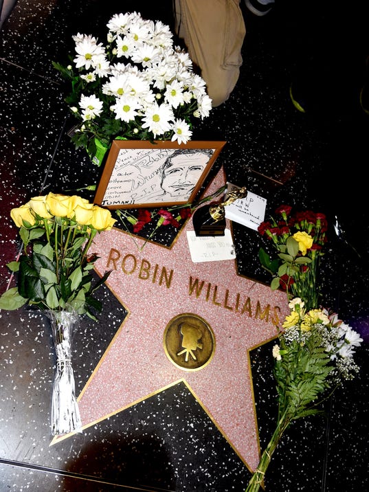 Robin Williams found hanged with a belt, cops say