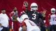 Arizona Cardinals quarterback Carson Palmer fires to