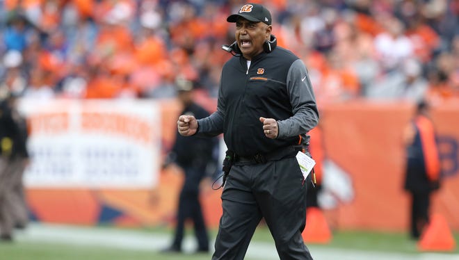 Cincinnati Bengals head coach Marvin Lewis encourages the team in the second quarter during the Week 11 NFL game between the Cincinnati Bengals and the Denver Broncos, Sunday, Nov. 19, 2017, at Sports Authority Field at Mile High in Denver, Colorado. 