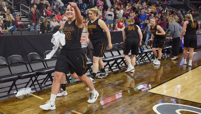 Harrisburg's Jeniah Ugofsky points to her classmates after their win against Lincoln Friday, March 16, at the Denny Sanford Premier Center in Sioux Falls.
