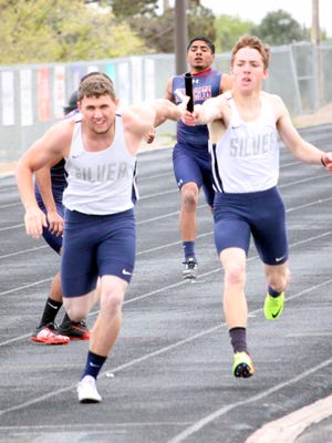 Silver High took first in the 400-meter relay with a time of 44.82 seconds. On the team were Brandon Chavez, Stephen Cross, Rocky Diaz and Joe Hansen. Above, is an exchange of the baton during the event at Fox Field last Saturday.