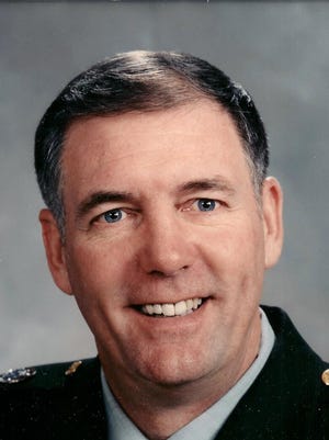 Col. Dennis George