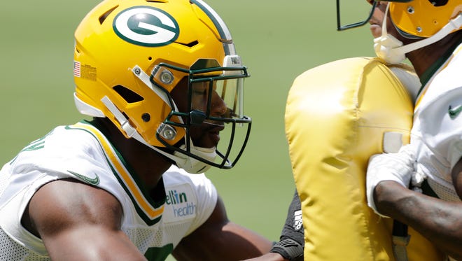 Green Bay Packers running back Ty Montgomery works on a blocking drill during practice at minicamp last Wednesday.