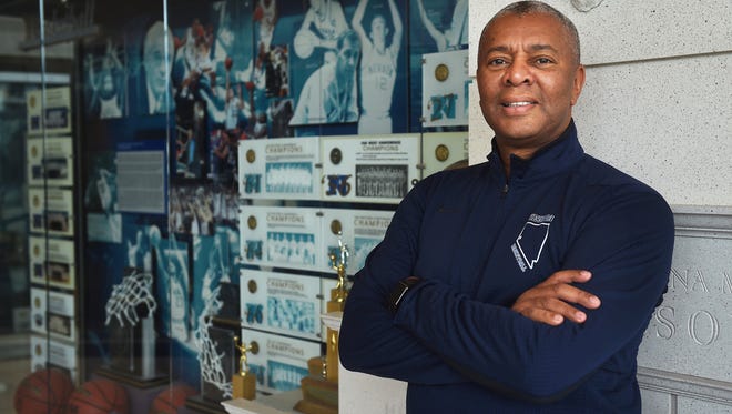 Johnny Jones, the Wolf Pack's new associate head basketball coach, poses for a portrait on campus Wednesday.