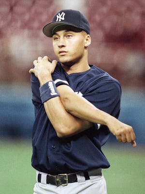 Rookie Derek Jeter of the New York Yankees warms up  Monday, May 29, 1995 in Seattle prior to a game against the Mariners.