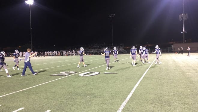 Pinnacle runs out onto the field against Cesar Chavez on Friday.