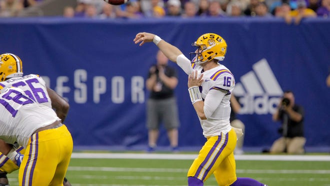 LSU quarterback Danny Etling (16) passes against BYU in the first half of an NCAA college football game in New Orleans, Saturday, Sept. 2, 2017. (AP Photo/Scott Threlkeld)