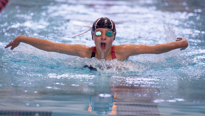 Stingrays' Malana Sturgeon swims the butterfly in the 11-12 100 individual medley July 19 during the Tri-County Aquatic League championships at Denison University.