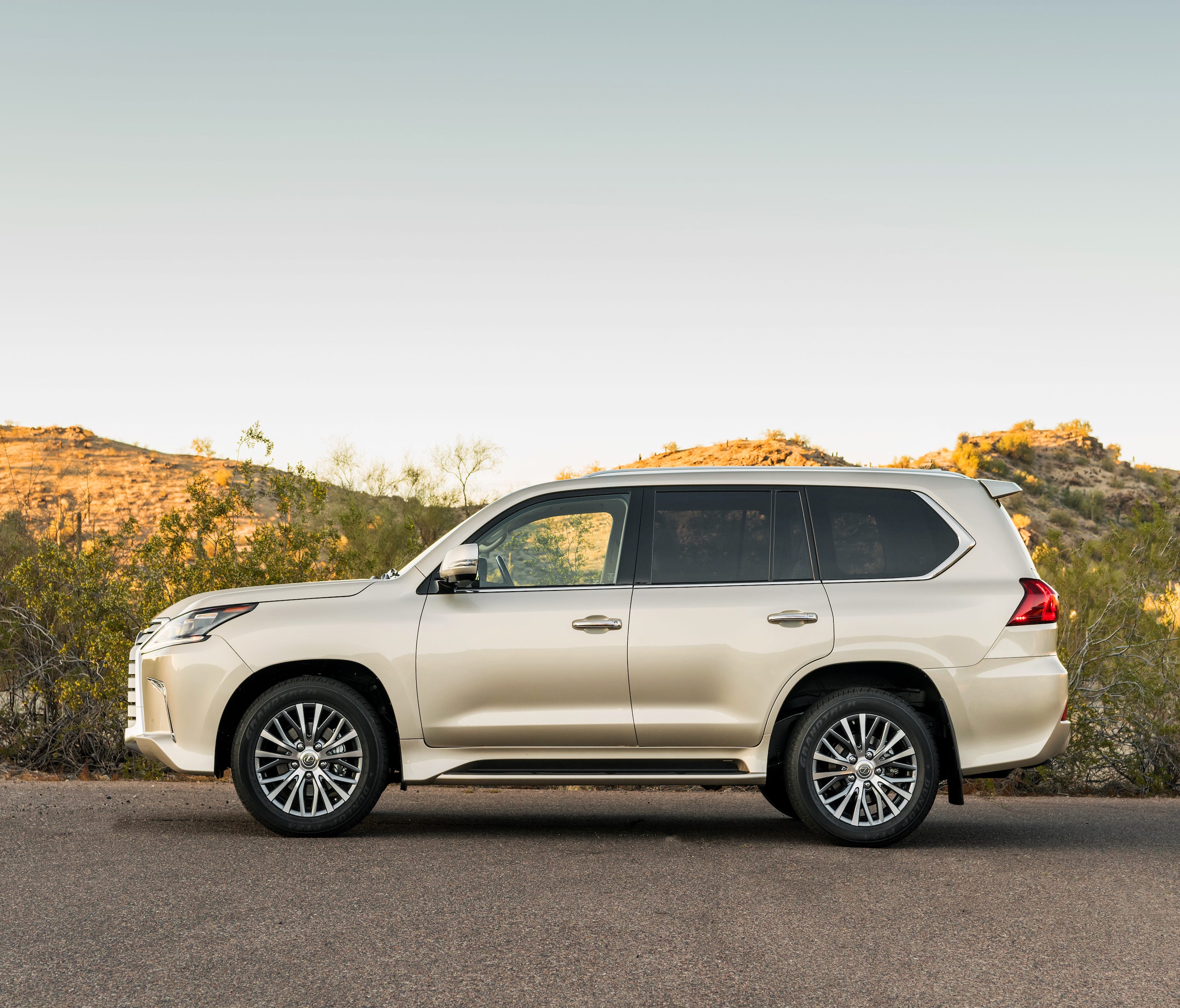 From the side, the Lexus LX 570 shows its stature