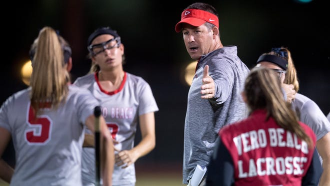 Vero Beach High School girls lacrosse coach Shannon Dean, shown talking to his players during a game earlier this season, hopes to lead the Fighting Indians back to a state title.