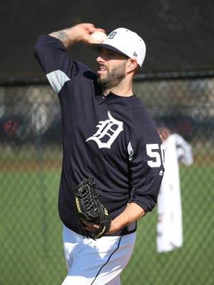 Tigers pitcher Mike Fiers throws in the bullpen during spring training workouts on Friday, Feb. 16, 2018, at Joker Marchant Stadium in Lakeland, Fla.