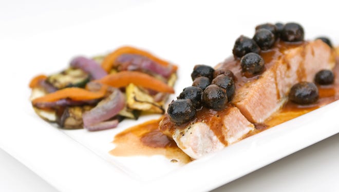 The omega-3 fatty acid in salmon with blueberry guajillo sauce helps counter inflammation.