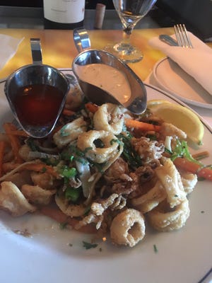 Truluck’s bar has a great bar menu loaded with delicious seafood appetizers that are perfect for sharing, including salt and pepper calamari.