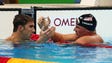 Michael Phelps and Ryan Lochte react after the men's