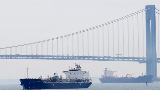 Concerns about a jump in oil imports from Iran and other countries pushed down oil prices Wednesday.