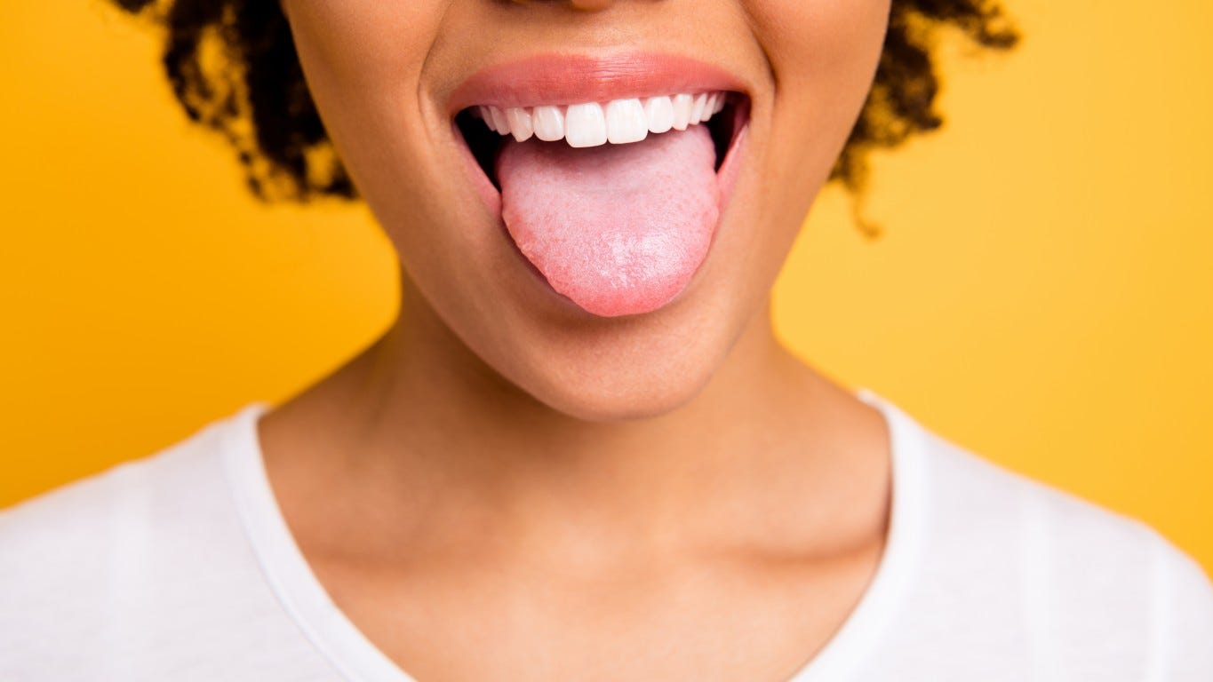 What is saliva and how does it change the flavor of food?