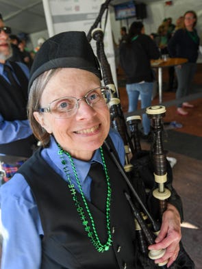 Sue Seidenfeld of Waukee stands in line for a beer