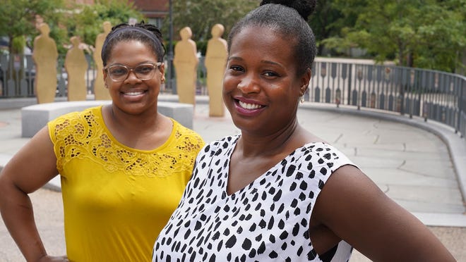 Courtney Daniel, left, and Jade Lee, seen at the Portsmouth African Burying Ground Memorial Park in