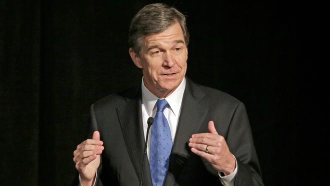 In this June 24, 2016, file photo, North Carolina Attorney General Roy Cooper speaks during a forum in Charlotte. Cooper made appealing House Bill 2 part of his campaign.