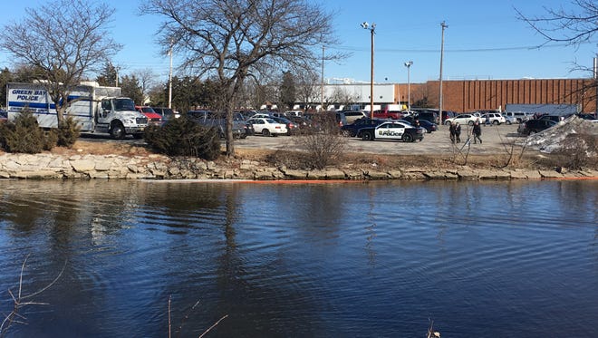 A Green Bay Police Department dive team recovered a body Thursday afternoon from the East River near the Georgia Pacific property east of the University Avenue bridge.