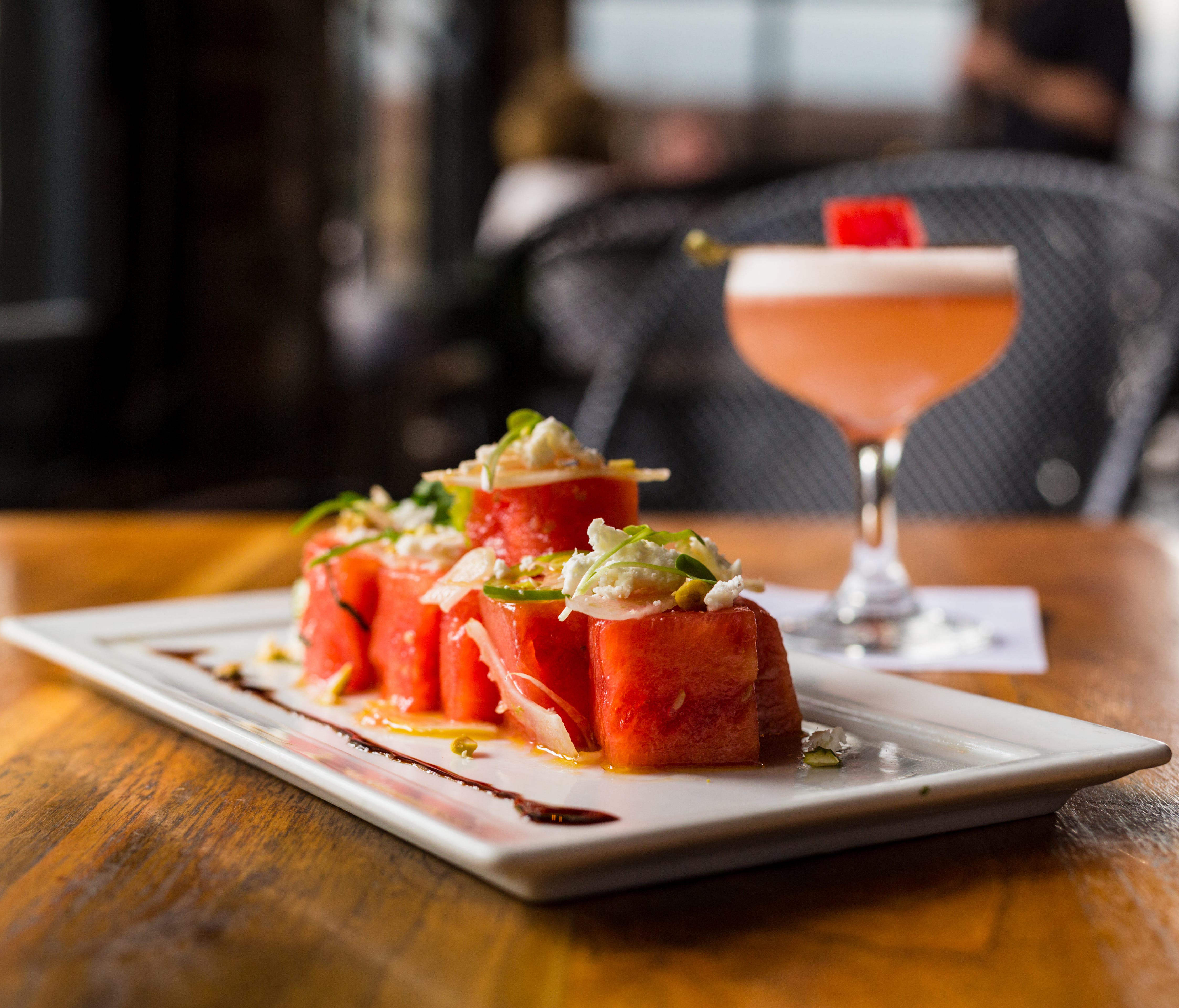 In Columbia, South Carolina, Motor Supply Co. Bistro offers the Bradford Watermelon Salad with pistachios, Trail Ridge Farms Feta, shaved jalapeno, fennel, Pernod syrup, pomegranate molasses and City Roots Microgreens. Pair with a Watermelon Sour, wh