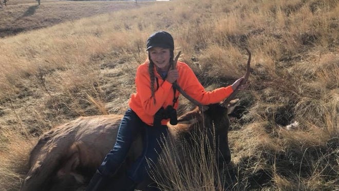 Olivia Isakson, 14, had two successful hunts in 2017. She got this spike bull elk during one of them.