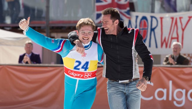 Bronson (Hugh Jackman) and Eddie (Taron Egerton) in "Eddie the Eagle." (Larry Horricks/Twentieth Century Fox)