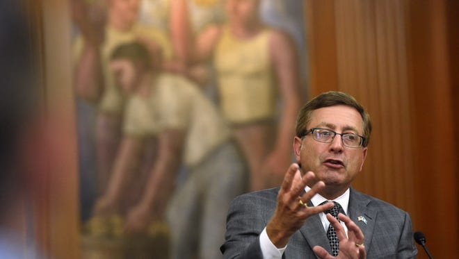 Sioux Falls mayor Mike Huether discusses his decision to veto the City Administration building Ordinance repeal during a press conference on Wednesday at City Hall.