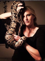 Greenville’s Sandi Morris poses with one of her five