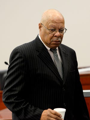 Former Ingham County Prosecutor Stuart Dunnings III walks back to his chair after giving a statement during his sentencing hearing to Genesee County Circuit Court Judge Joseph Farah  Tuesday, Nov. 22, 2016 in Judge Clinton Canady III's courtroom at Veterans Courthouse in Lansing.  Dunnings was sentenced to 365 days in jail and two years of probation after pleading guilty Aug. 2 to misconduct in office and a misdemeanor charge of engaging in the services of a prostitute.
