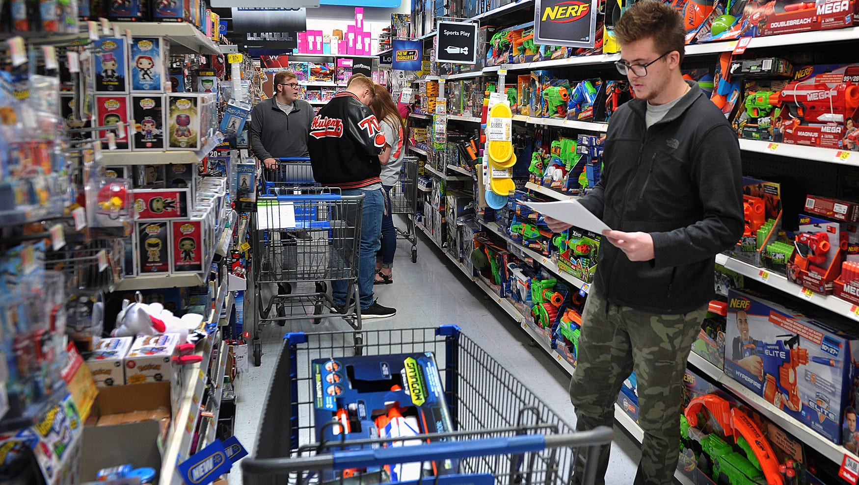 Officers Burk Students Buy Gifts For Less Fortunate Children