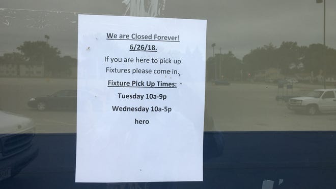 A sign on the front doors of Toys "R" Us, 1640 W. Mason St., notifies patrons it has closed "forever."