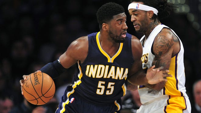 Indiana Pacers center Roy Hibbert (55) controls the ball against Los Angeles Lakers center Jordan Hill (27) during the first half at Staples Center.