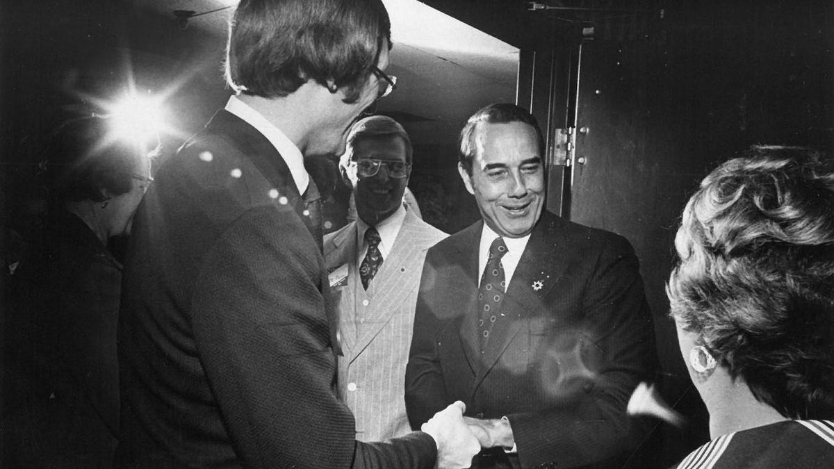 Sen. Bob Dole, R-Kan., won reelection to his second term in office in November 1974. This photo showed him greeting well-wishers the following year at a reception held in his honor in the lower lounge of the Downtown Ramada Inn.