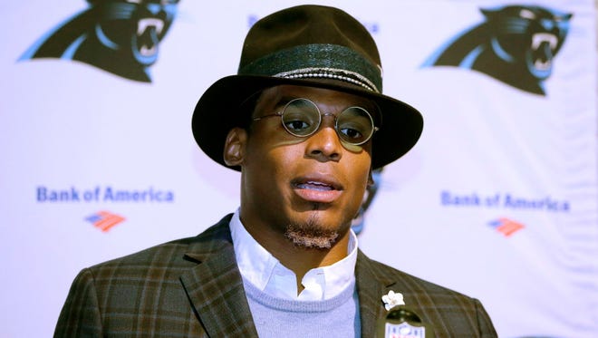 Carolina Panthers quarterback Cam Newton speaks to the media following a win over the New England Patriots in Foxborough, Mass.