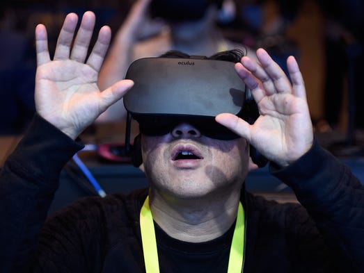 An attendee participates in a virtual-reality presentation