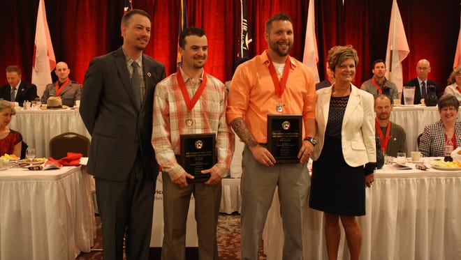 EJ Folli and Chris Hand received the Workplace Safety Award at the Ninth Annual Real Heroes Breakfast Thursday morning.