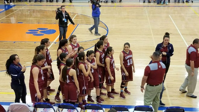 The Deming High Lady Wildcats are introduced prior to the start of the Class 5A State Playoffs at Los Lunas High School.