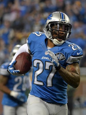 Lions safety Glover Quin returning an interception.