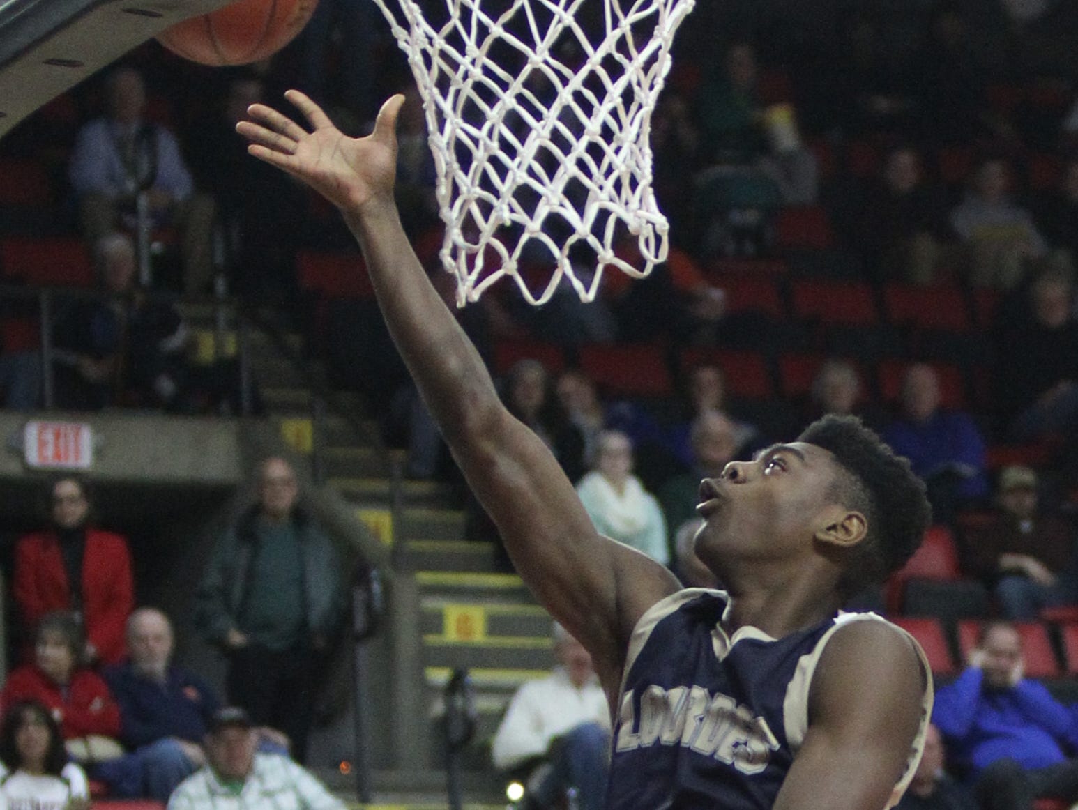 Our Lady of Lourdes's Kevin Townes (13) puts up a shot during their 70-67 win over Southampton in the NYSPHSAA boys Class A semifinal basketball game at Floyd L. Maines Veterans Memorial Arena in Binghamton on Saturday, March 18, 2017.