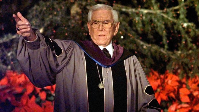 Rev. Robert H. Schuller delivers a Christmas Eve services from the Crystal Cathedral pulpit in Garden Grove, Calif., in 1997.