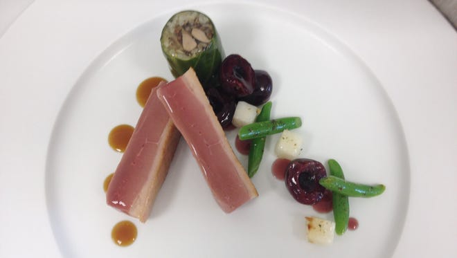 This dish — Seared Duck Breast, Cherries, Grain and Cabbage Roll with Braised Leg, Haricot Vert, Turnips, Jus Lie — was created by Jeremy Abbey, one of five Michigan chefs who’ll compete in the Culinary World Cup in Luxembourg in November.