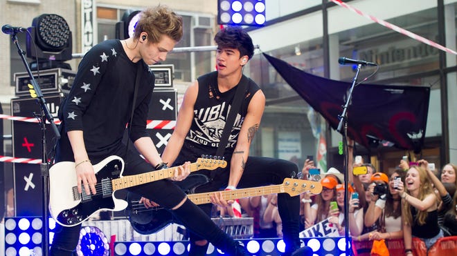 5 Seconds of Summer band members Luke Hemmings, left, and Calum Hood perform on NBC's "Today" show on July 22 in New York.