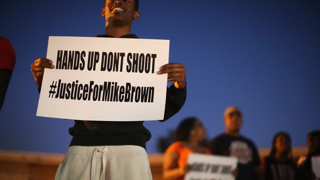 Ferguson Protests Give New Meaning To Hands Up Sign