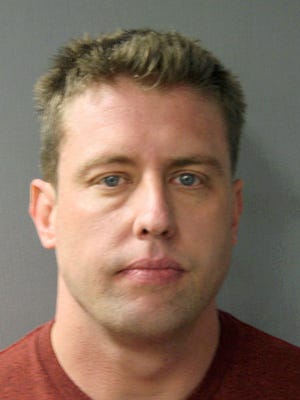 An undated handout photo made available by the St. Louis Police Department shows former police officer Jason Stockley.