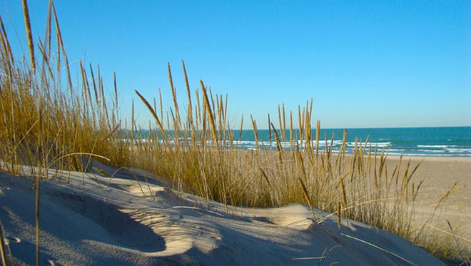 The Indiana Dunes State Park and the Dunes National Lakeshore provide views of sand and spray not often associated with Indiana.