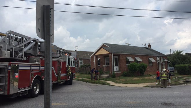 Three people were displaced because of a kitchen fire in a home in the 800 block of Chestnut Street on Saturday morning.