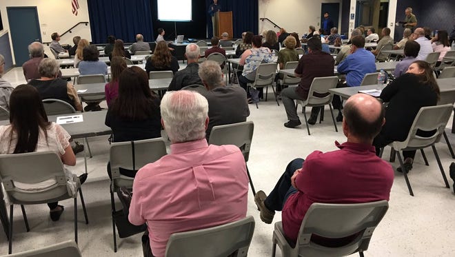Tempers flared at times at a community meeting Thursday night in Simi Valley on a proposed apartment complex for low-income senior veterans.